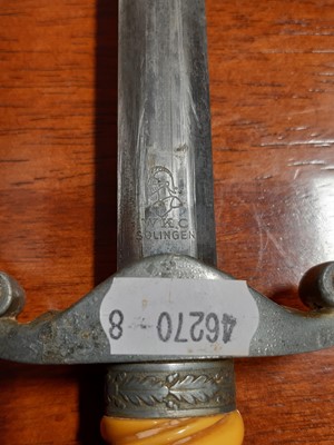 Lot 135 - Three replica German dress daggers and a replica socket bayonet