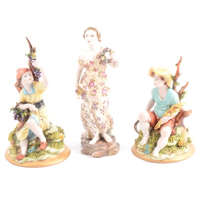 Lot 7 - Pair of Capodimonte figures and another continental figure.