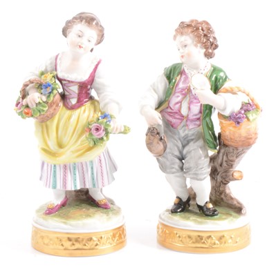 Lot 21 - Two continental porcelain figures by Aelteste Volkstedter, with boxes and leaflets.