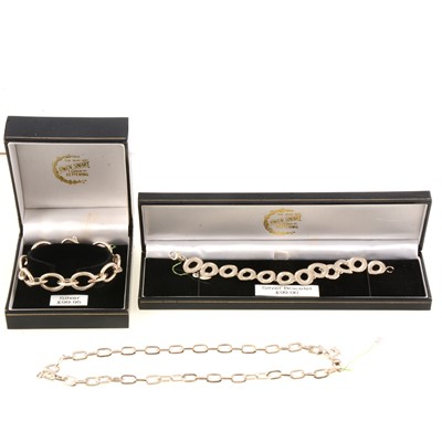 Lot 242 - Two silver bracelets and a chain link necklace, new with two boxes.