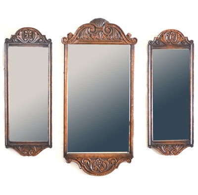 Lot 484 - Three carved oak framed wall mirrors