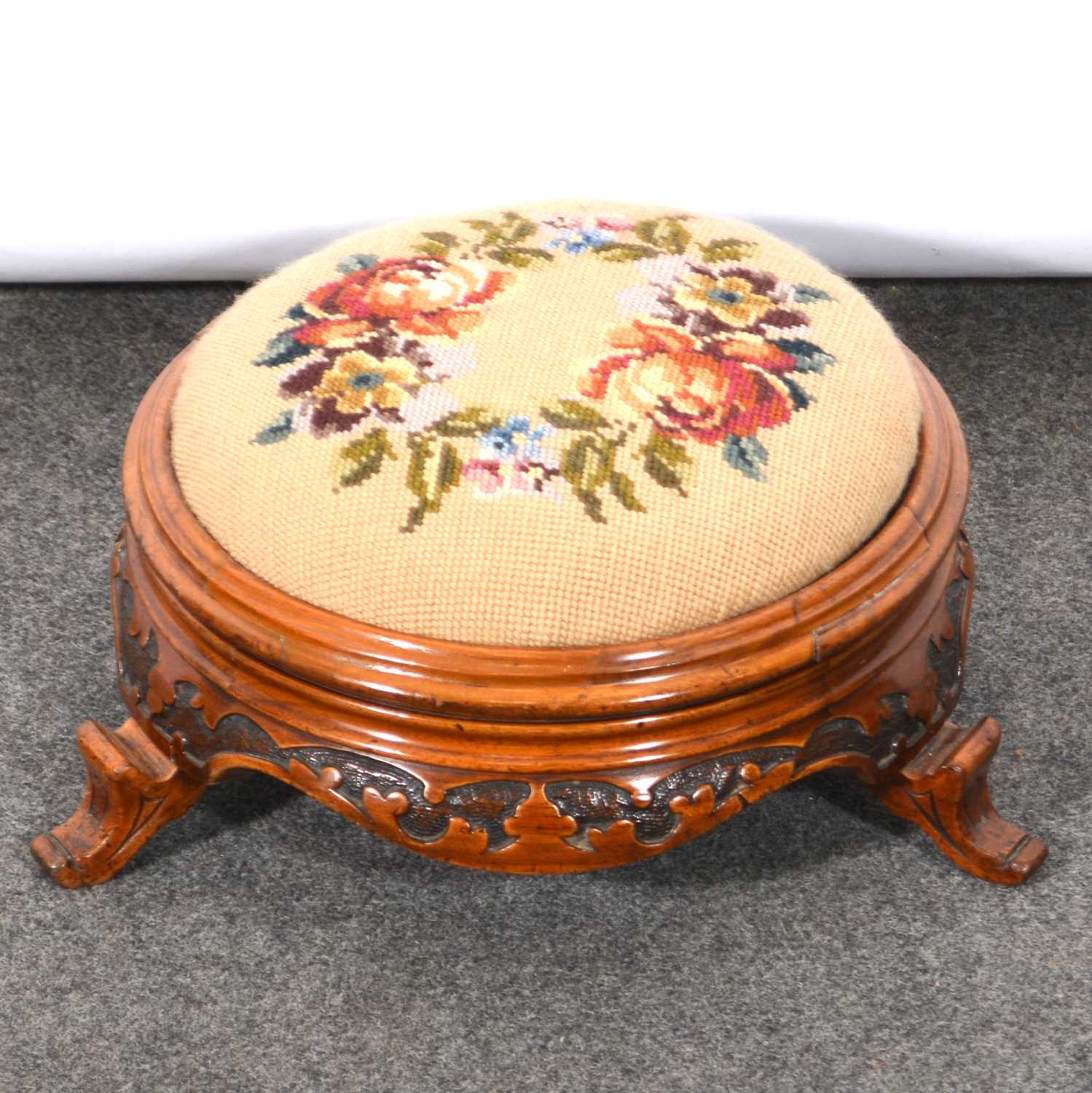 Lot 566 - Victorian carved walnut footstool