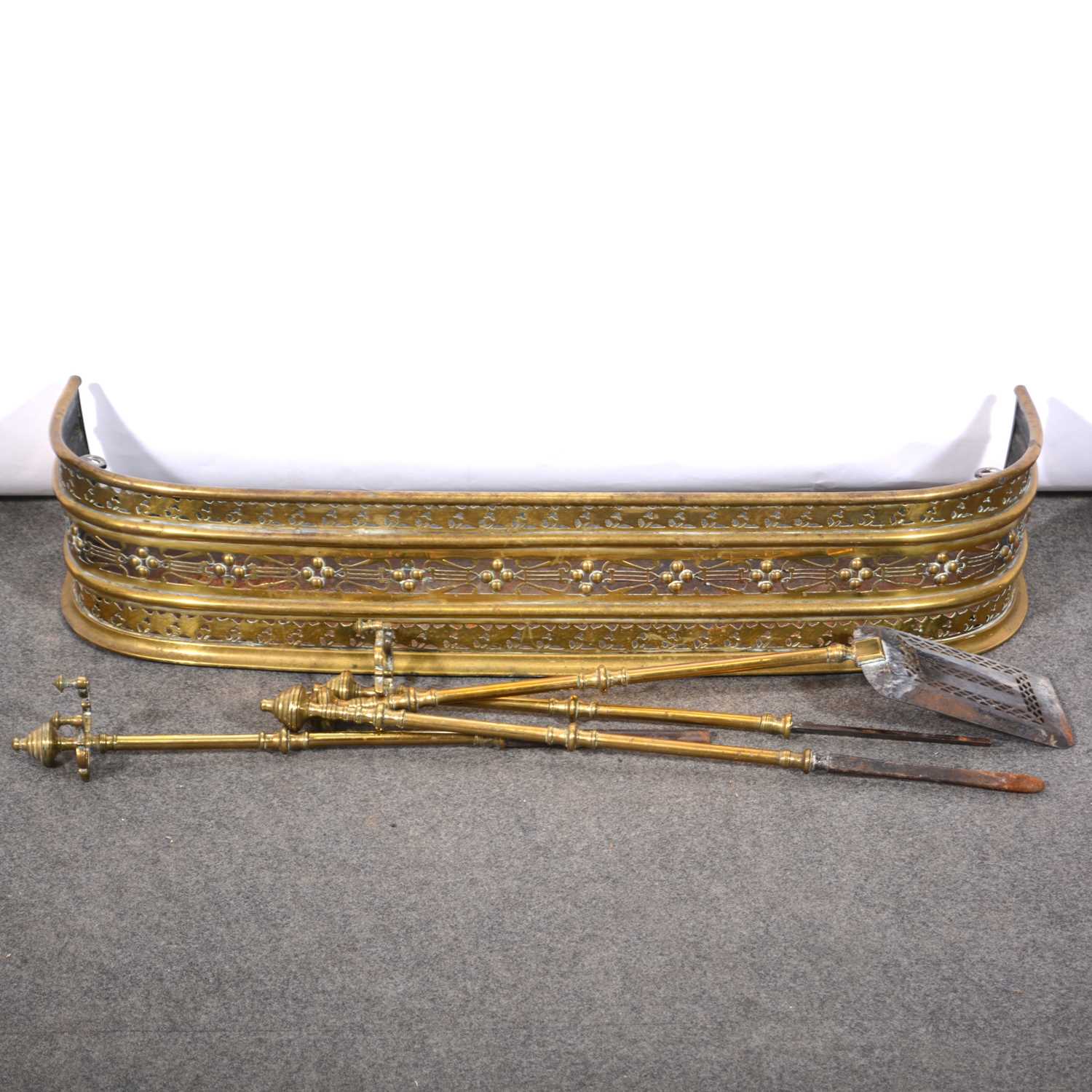 Lot 534 - Pierced brass curb with integral irons, brass log bin, coal scuttle, etc