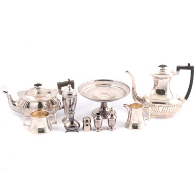 Lot 93 - Silver-plated three piece teaset, coffee pot, bottle coaster, condiments.