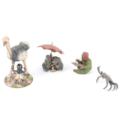 Lot 198 - Four small lead and white metal painted figures.