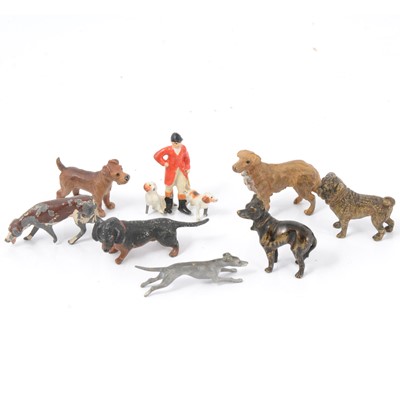 Lot 200 - Eight miniature cold-painted bronze and white metal dog figures.