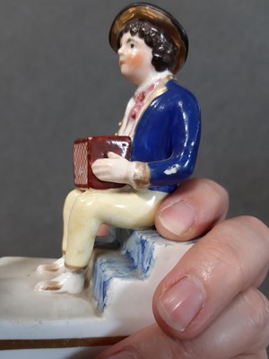 Lot 20 - Two Staffordshire figures, Italian Boy and Souter Johnnie