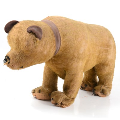 Lot 239 - Early 20th-century straw-filled bear, 45cm in length.