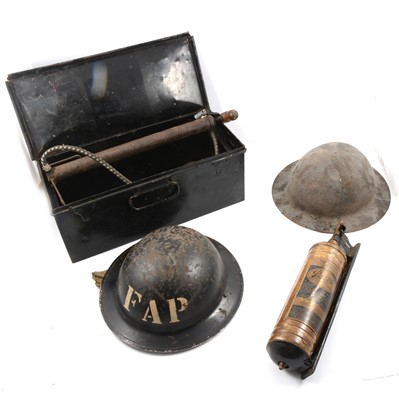 Lot 71 - WW2 British FAP Brodie helmet, another, and an enameled tin containing various items
