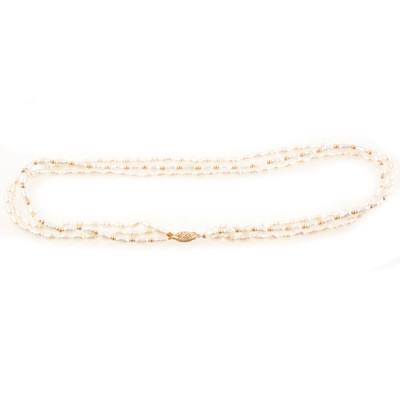 Lot 332 - Freshwater pearl three string choker.