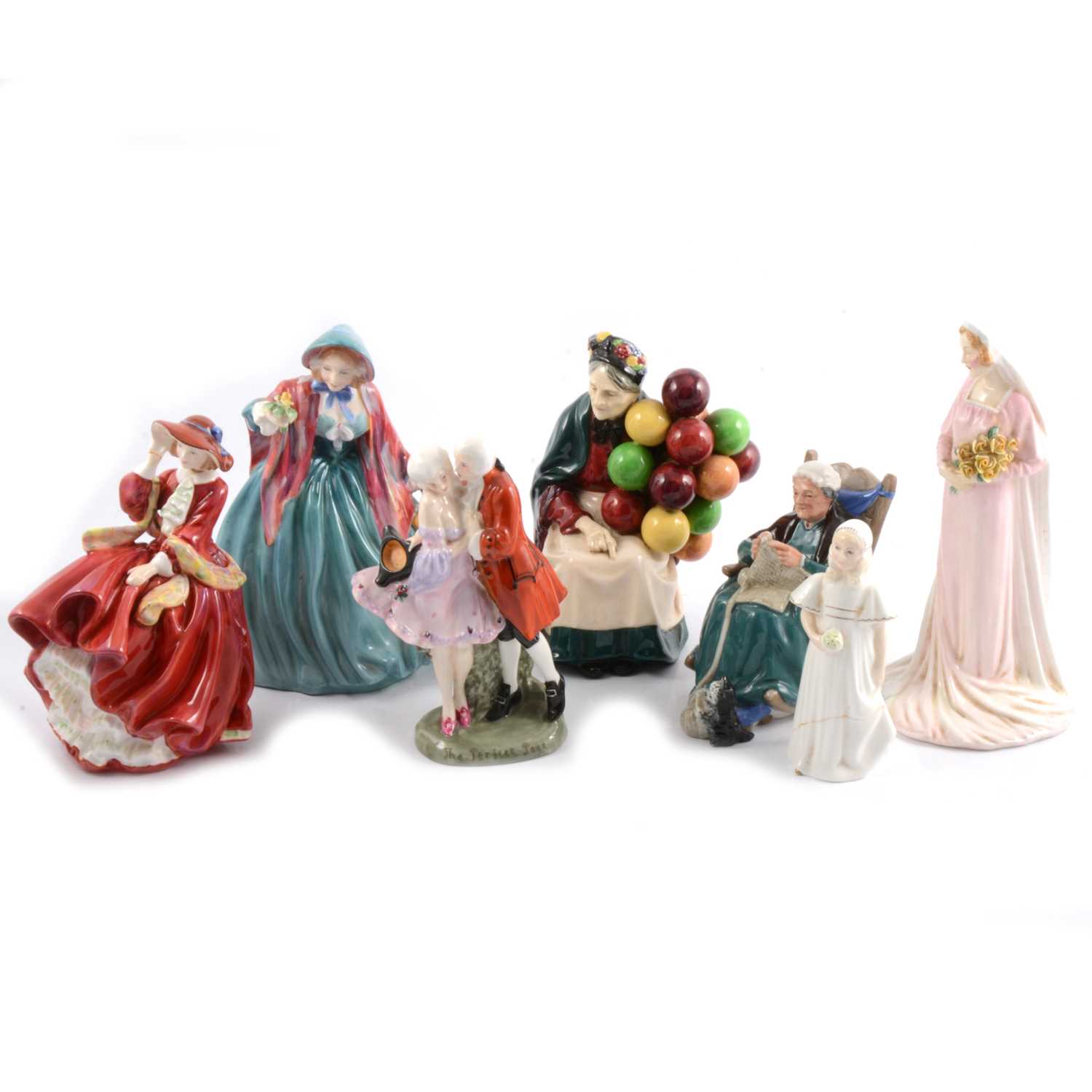 Lot 10 - Seven Doulton figures, including 'The Perfect Pair' HN412.