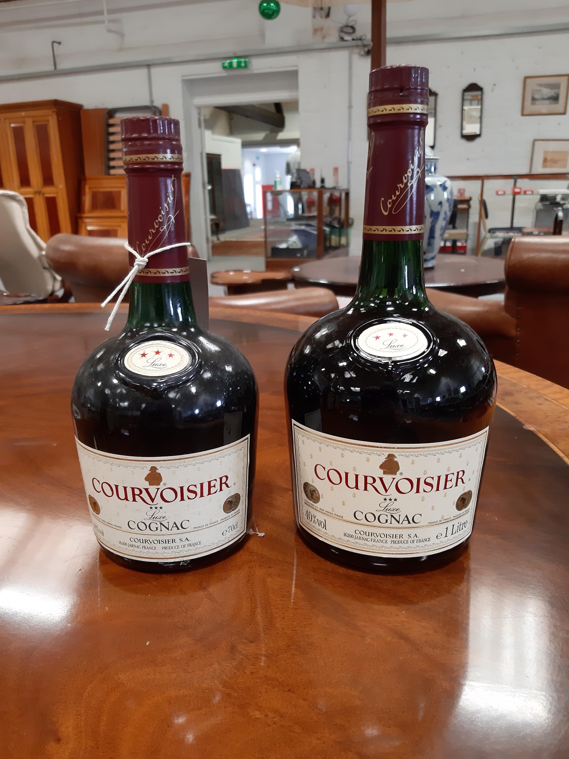 Lot 295 Two bottles of Courvoisier 3star cognac,