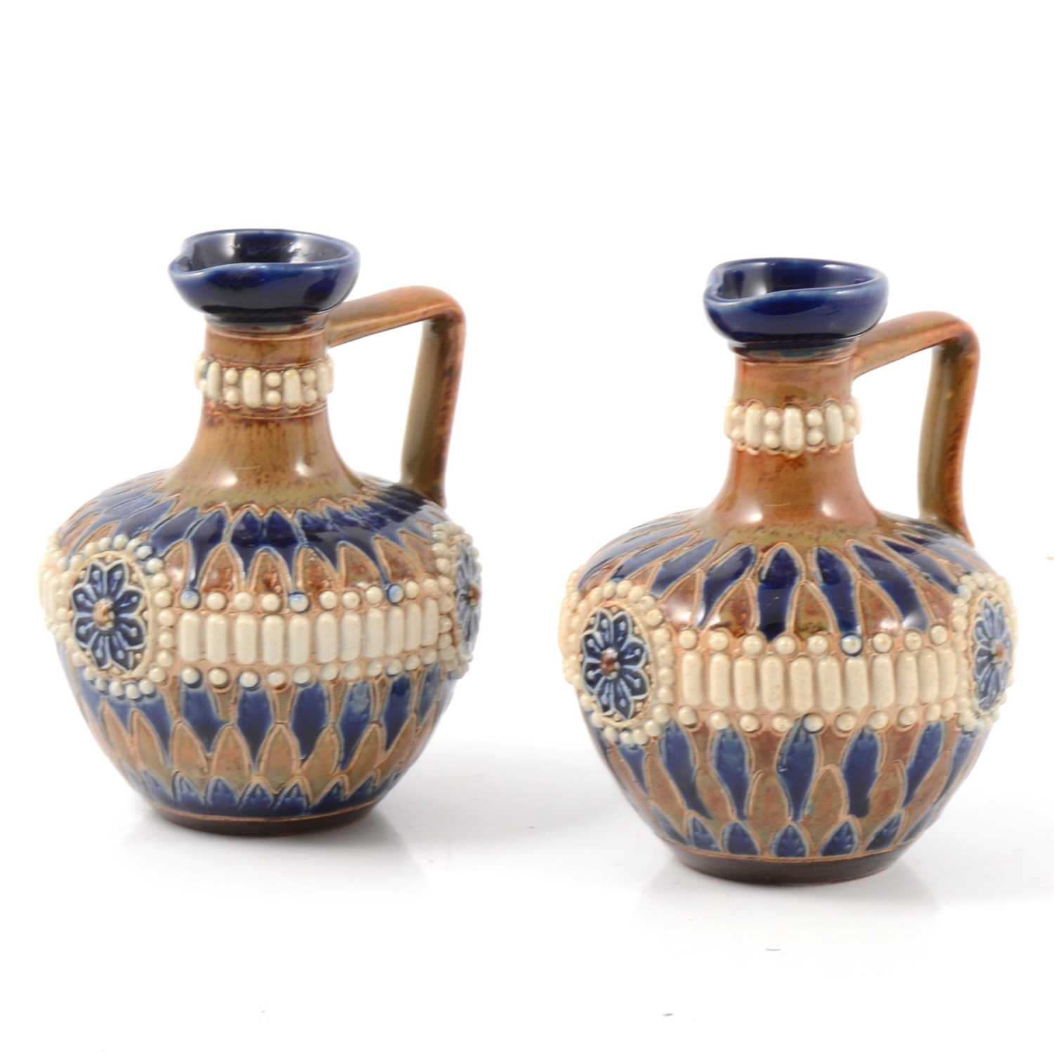 Lot 1 - Pair of Doulton Lambeth stoneware jugs/ ewers
