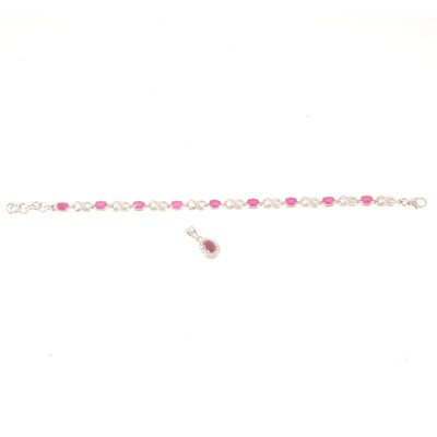 Lot 177 - Gemporia - A Malagasy ruby and diamond bracelet, and a ruby and white topaz pendant.