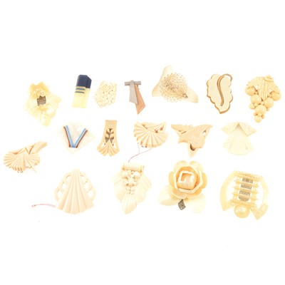 Lot 205 - Vintage faux ivory dress clips in celluloid, bakelite and acrylic.