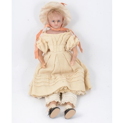 Lot 93 - A Victorian poured wax doll, blue glass eyes, wax limbs, rag body, 37cm.