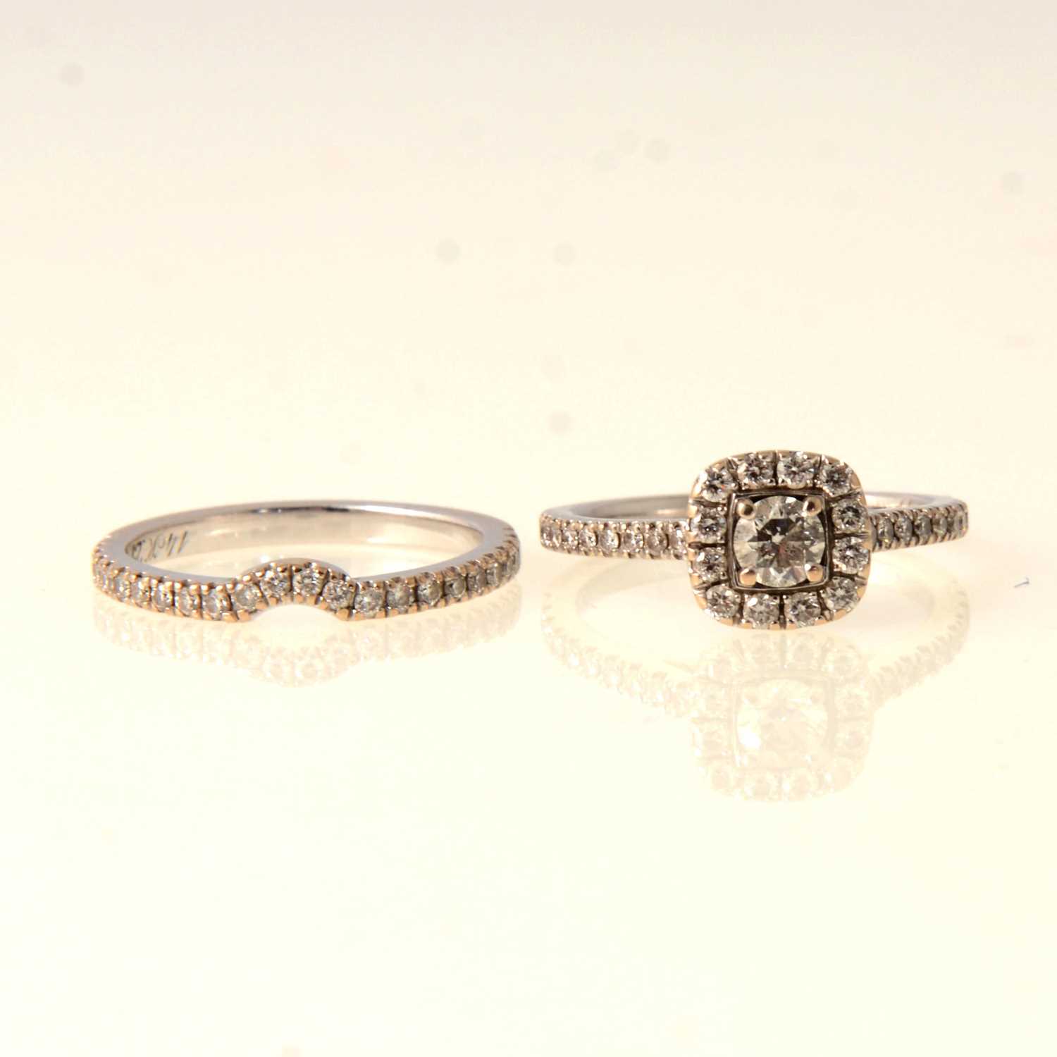 Lot 65 - Neil Lane diamond engagement and fitted wedding ring.