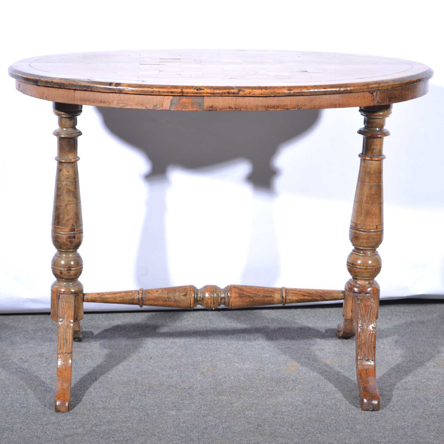 Lot 567 - Victorian walnut chess table, oval inlaid top.