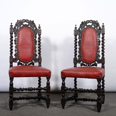 Lot 472 - Pair of carved oak hall chairs