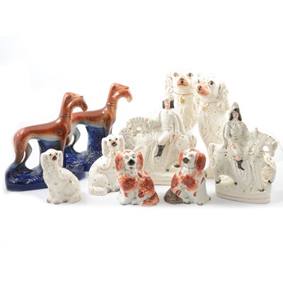 Lot 56 - Pair of Staffordshire greyhounds with rabbits, pair of flat back figures on horseback and dogs.