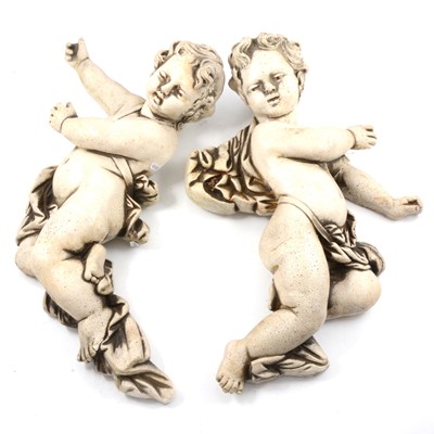 Lot 557 - Pair of plaster reproduction wall mounted cherubs, composition wall plaque.