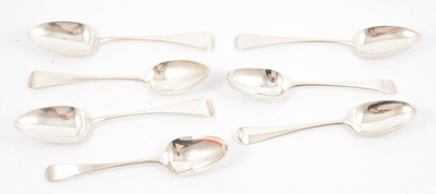 Lot 267 - Eight antique silver table spoons.