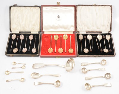 Lot 266 - Silver condiment spoons, three cased sets of spoons (one enamel spoon missing), sauce ladle