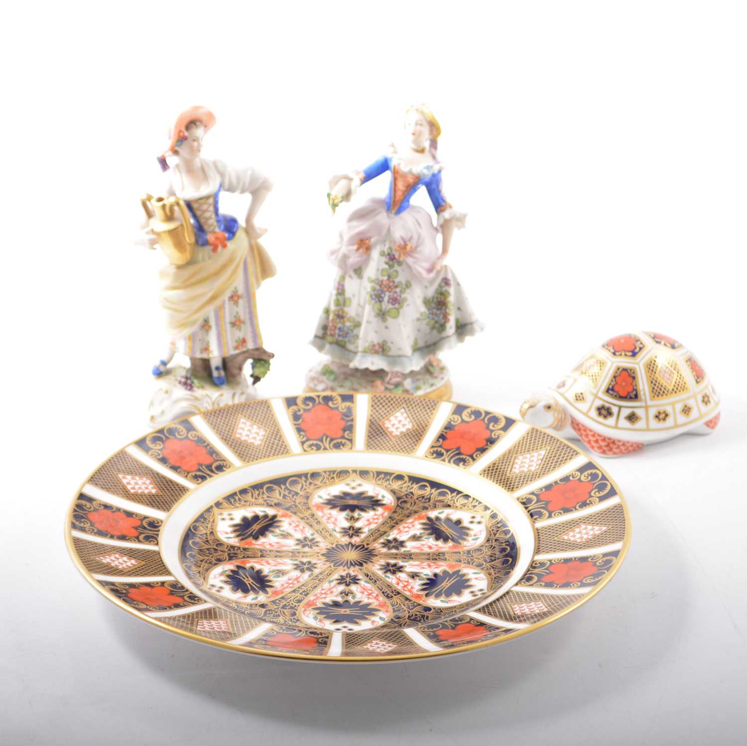Lot 14 - Royal Crown Derby Imari plate, tortoise paperweight and two continental figurines.