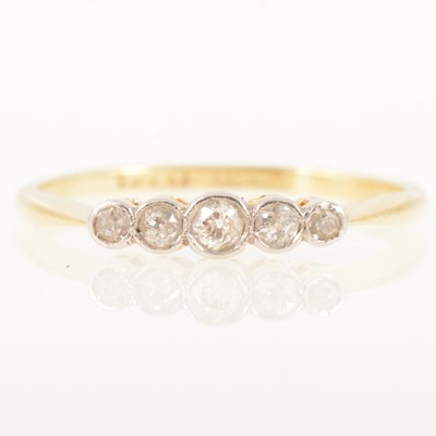 Lot 159 - A diamond five stone ring, illusion set.