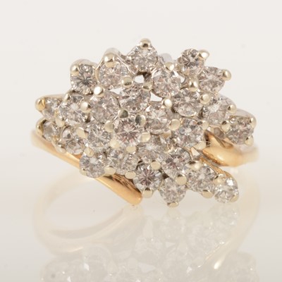 Lot 15 - A contemporary diamond multi stone cluster ring.