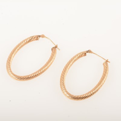 Lot 167 - A pair of 9 carat gold hoop earrings.
