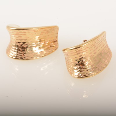 Lot 324 - A pair of yellow metal wide hoop earrings, marked 14K.