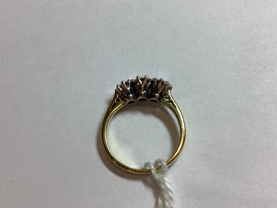 Lot 286 - A diamond three stone ring.