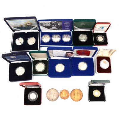 Lot 275 - A collection of silver commemorative coins in presentation boxes.