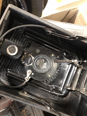 Lot 134 - Two old plate cameras, glass plates, splice.