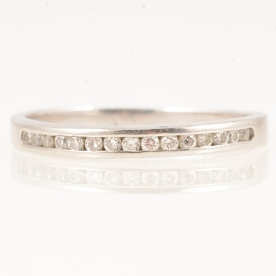 Lot 290 - A platinum diamond half eternity ring.