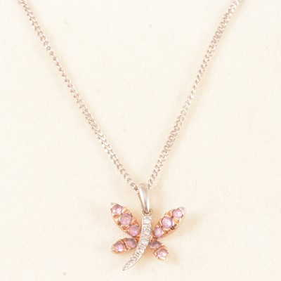 Lot 334 - A pink sapphire and diamond butterfly pendant.