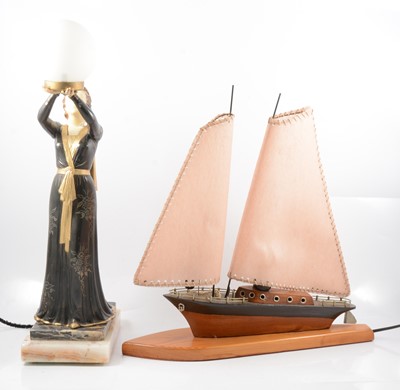 Lot 118 - Art Deco peach mirror,  an Art Deco figural lamp, and a wooden yacht lamp.