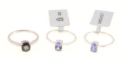 Lot 320 - Gemporia - Two Tanzanite and one Burmese multi-colour spinel solitaire rings.