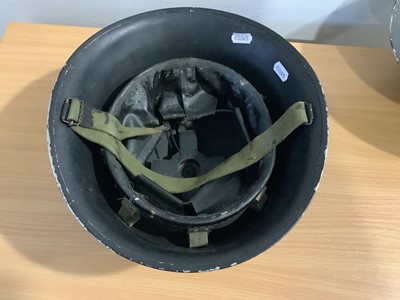Lot 136 - Three military tin helmets
