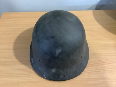 Lot 136 - Three military tin helmets