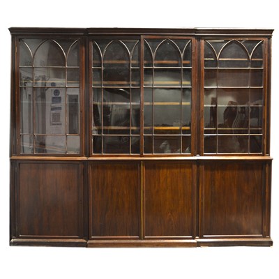 Lot 440 - A George IV mahogany breakfront library bookcase.