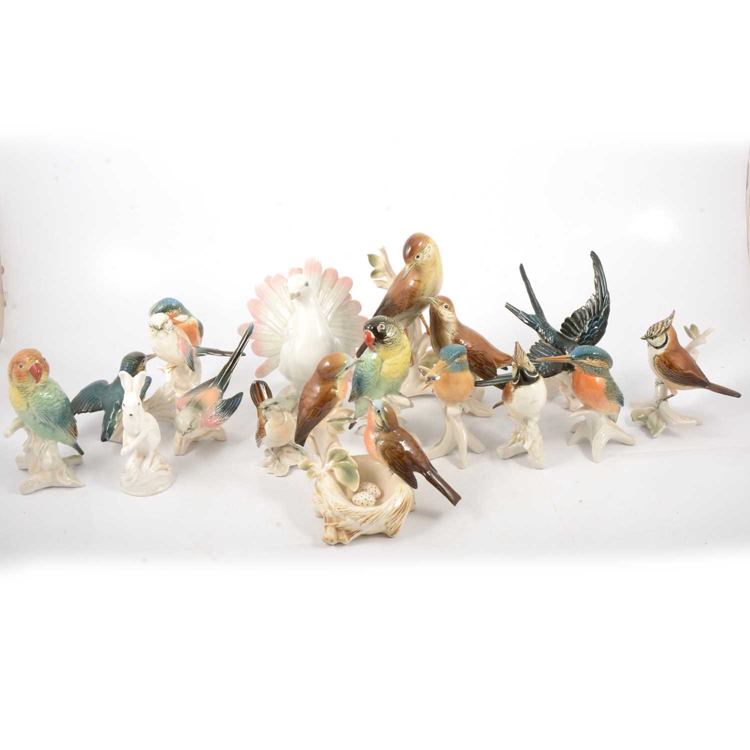 Lot 64 - A German model of a Dove; other pottery bird models.