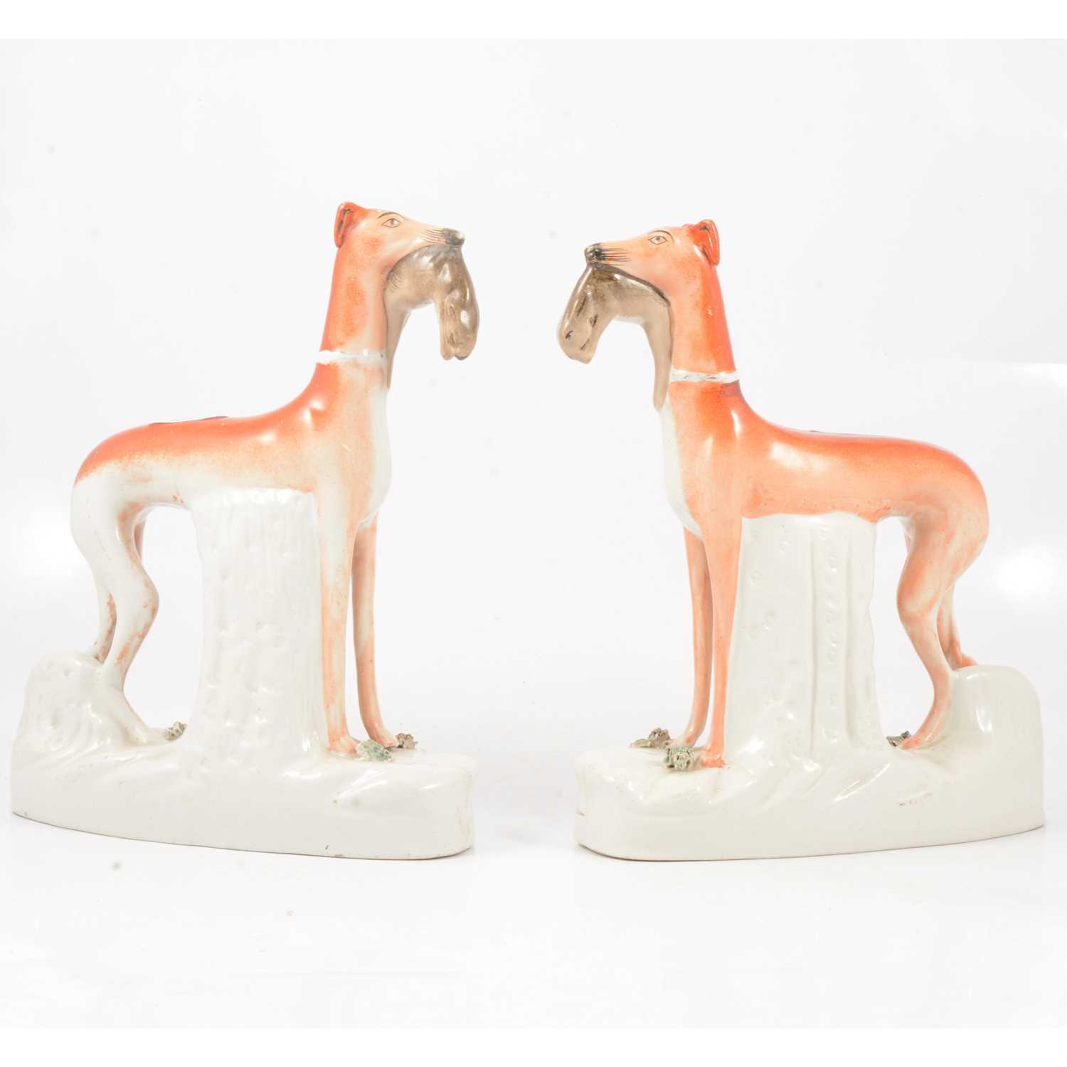 Lot 41 - A pair of large Staffordshire models of Greyhounds