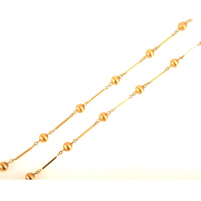 Lot 96 - An 18 carat yellow gold bead and bar necklace.
