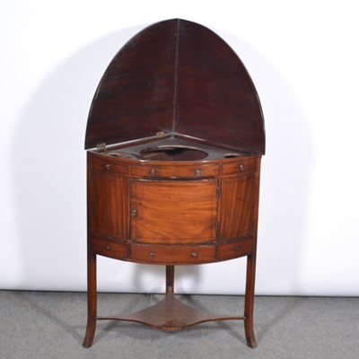 Lot 517 - George III mahogany cylinder front corner washstand