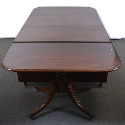 Lot 253 - Regency mahogany extending dining table