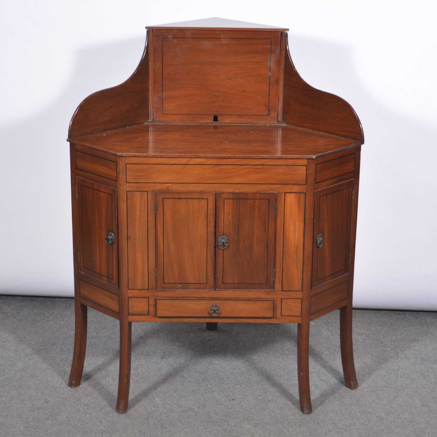 Lot 587 - George III mahogany corner washstand