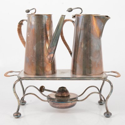 Lot 180 - Silver plated coffee pot, hot water jug and a hotplate