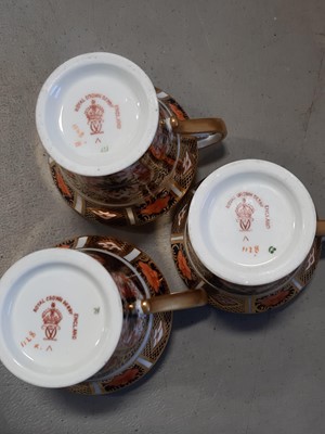 Lot 72 - A set of six Royal Crown Derby French pattern coffee cups and saucers, and a lobed dish